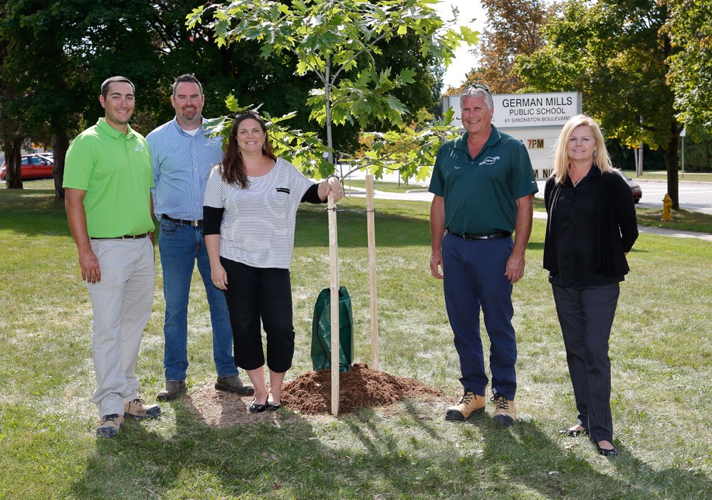 Some members of Head Office with the Principal of German Mills P.S. with the newly planted tree