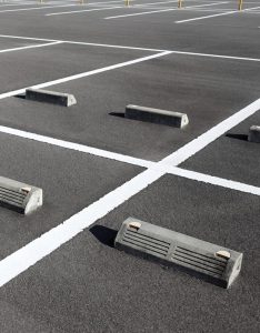 Freshly painted parking spaces as part of Clintar’s parking lot maintenance.