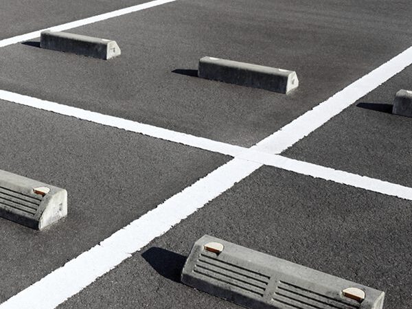 Freshly painted parking spaces as part of Clintar’s parking lot maintenance.
